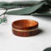 thick_cross_grain_santos_rosewood_ring_with_offset_14k_yellow_gold_inlay-2_compact Img